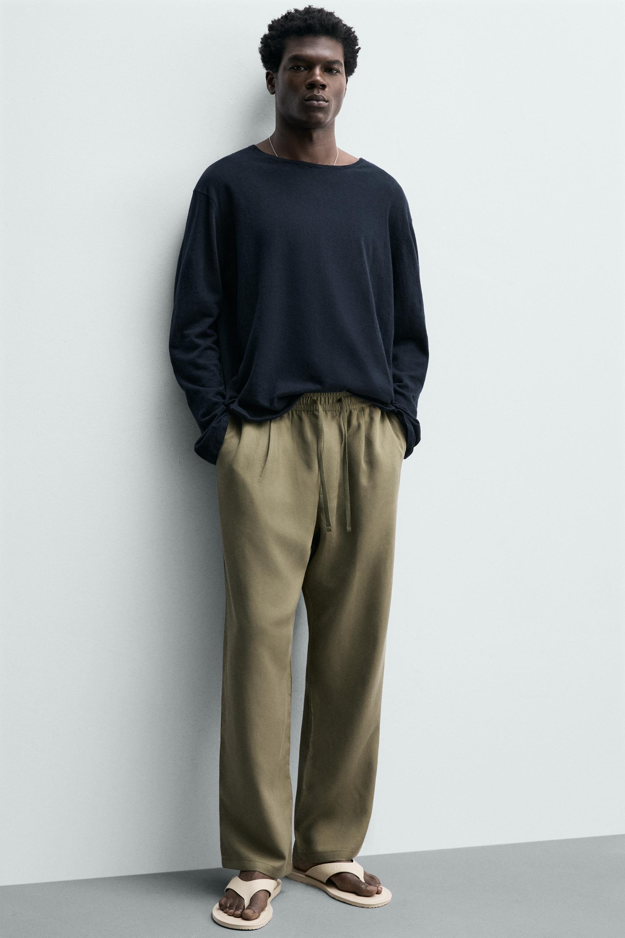 RELAXED FIT FLOWY PANTS